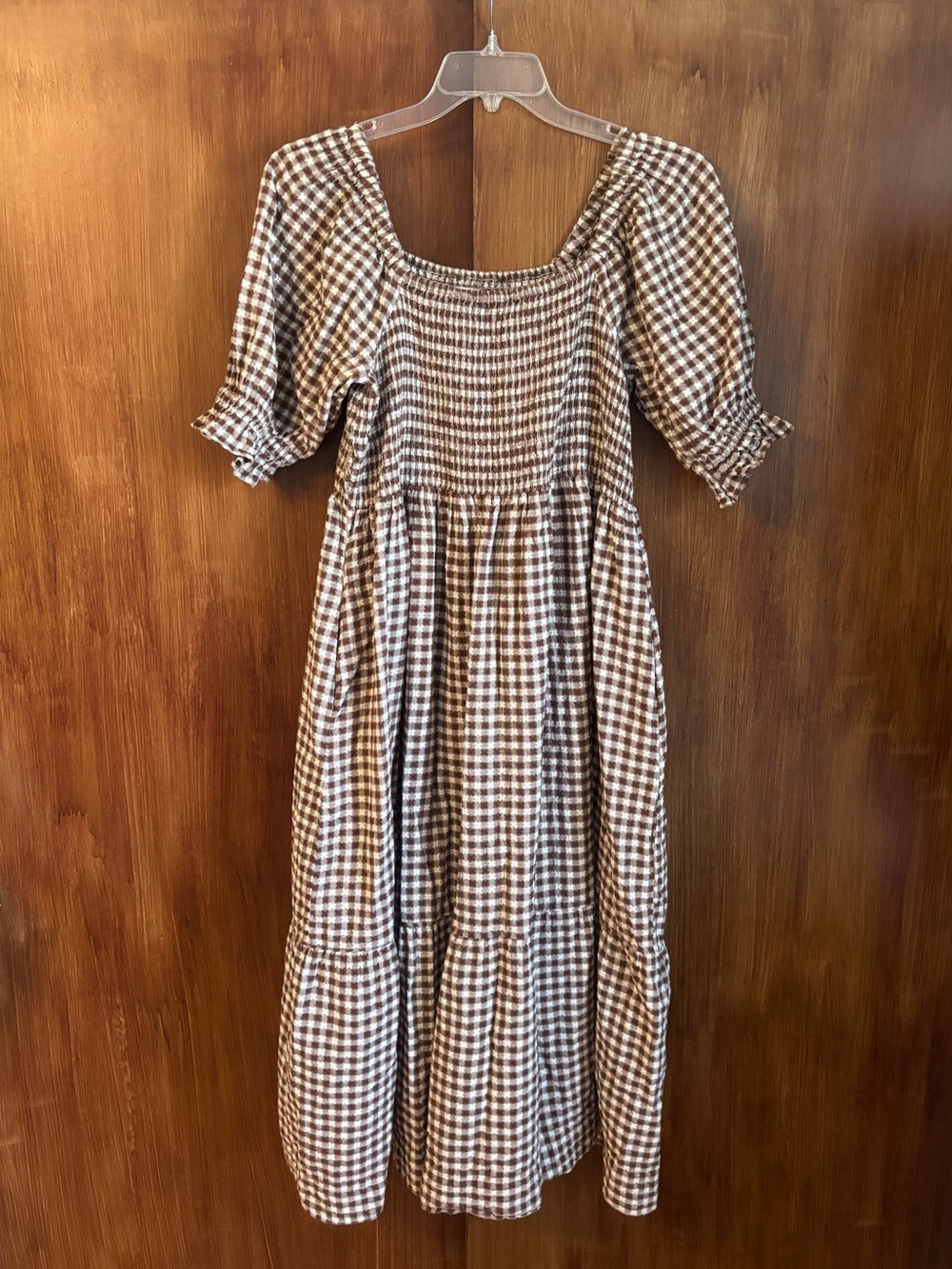 Lucie Elbow-Sleeve Smocked Midi Dress in Rich Brown Gingham